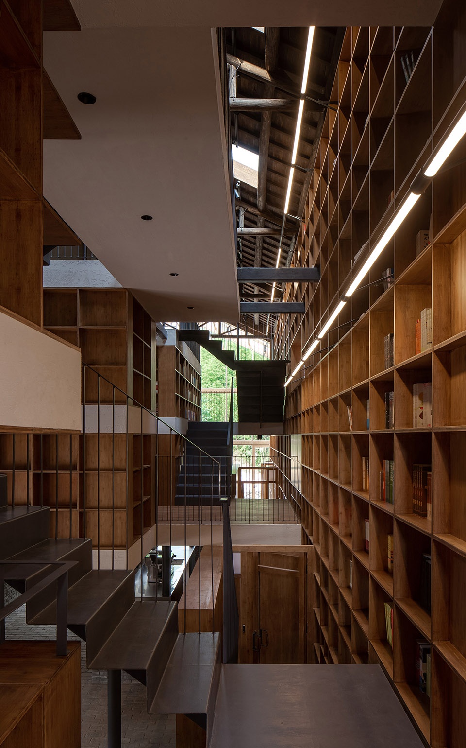 016-capsule-hotel-and-bookstore-in-village-qinglongwu-china-by-atelier-taoc-960x1539.jpg
