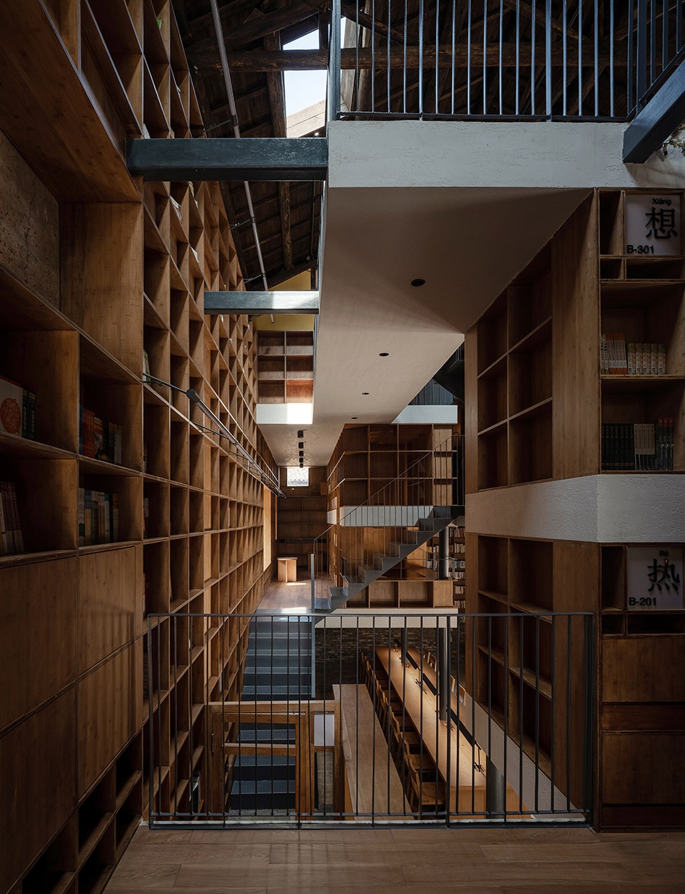 017-capsule-hotel-and-bookstore-in-village-qinglongwu-china-by-atelier-taoc-960x1252.jpg